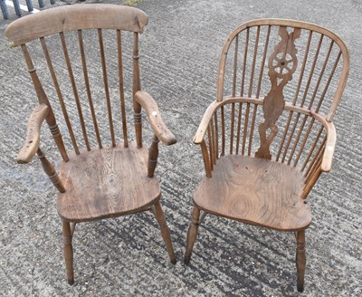 Lot 21 - A Windsor wheel back elbow chair with elm seat...