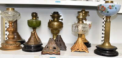 Lot 85 - Six assorted Victorian and later oil lamps,...