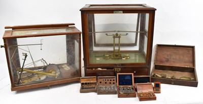 Lot 222 - Two sets of scientific laboratory scales in...