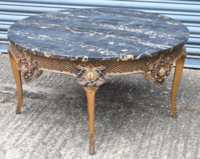 Lot 71 - A decorative French style gilt coffee table...