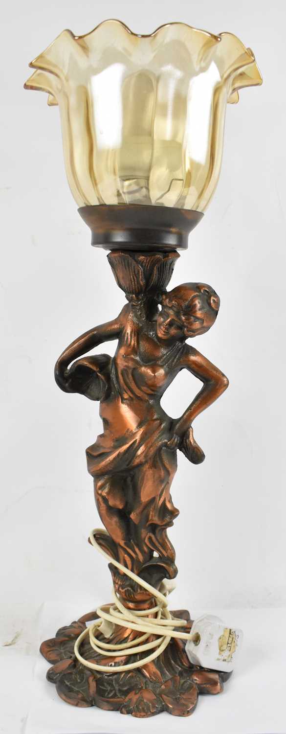 Lot 92 A spelter figural table lamp, with glass