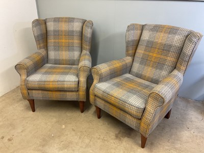 Lot 577 - A pair of Next upholstered wingback armchairs...