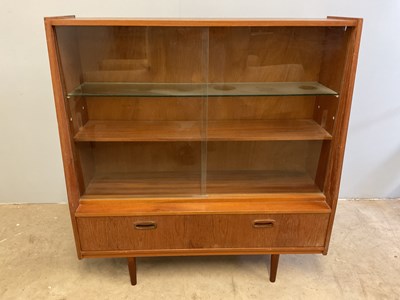 Lot 624 - A 1960s bookcase/side cabinet with glazed...
