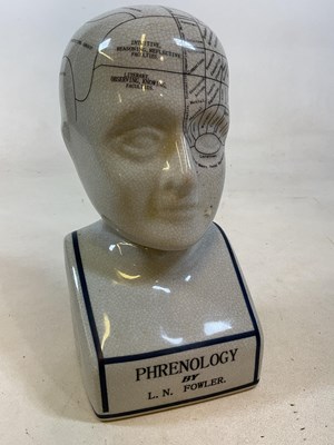 Lot 64 - AFTER FOWLER; a reproduction phrenology head,...