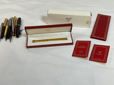 Lot 7 - A group of pens, including Must de Cartier, a...