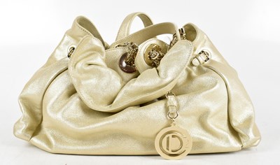 Lot 683 - CHRISTIAN DIOR; a metallic gold leather 'Le...