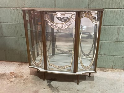 Lot 651 - A 1960s mirror backed display cabinet of...