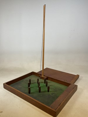 Lot 93 - A vintage table top skittles game and a shove...