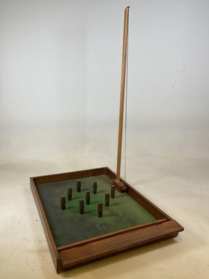 Lot 93 - A vintage table top skittles game and a shove...