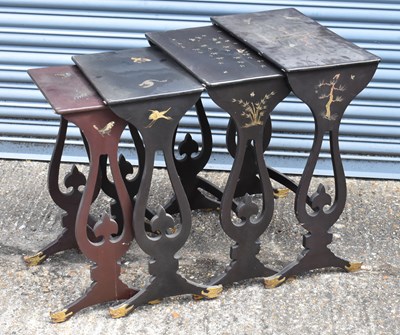 Lot 72 - A nest of four Japanese lacquered occasional...