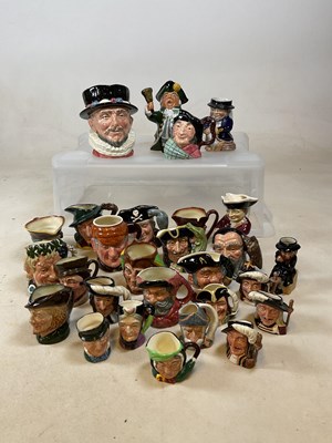 Lot 197 - A collection of character jugs (28) including...