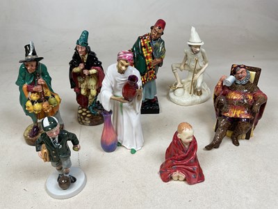 Lot 198 - ROYAL DOULTON; a collection of male figures...