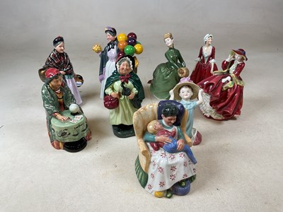 Lot 199 - ROYAL DOULTON; a collection of female figures...