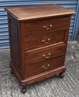 Lot 50 - A modern hardwood four drawer chest on short...