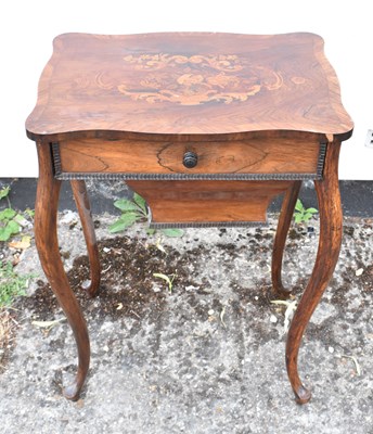 Lot 16 - A Edwardian inlaid rosewood sewing table, the...