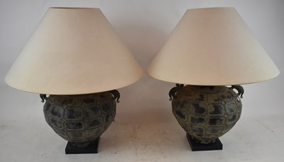 Lot 88 - A pair of decorative bronzed table lamps in...