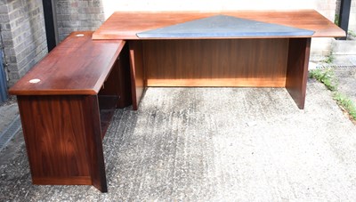 Lot 28 - A large 1970s rosewood L-shaped executive desk,...