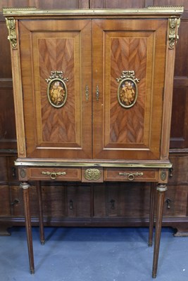 Lot 25 - A reproduction inlaid cocktail cabinet with...