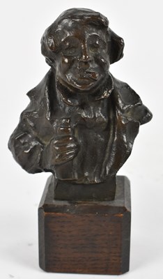 Lot 598 - TOM SAWYER; a bronze bust of a toper on oak...