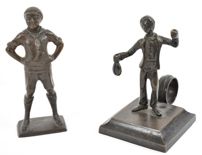 Lot 599 - A small bronze figure of a boy scout, height...