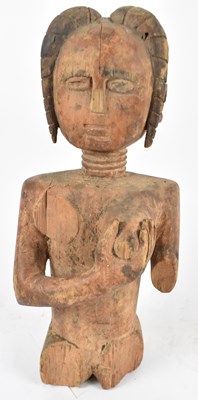 Lot 517 - TRIBAL ART; an African carved wooden female...