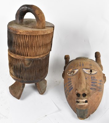 Lot 518 - TRIBAL ART; an African carved wooden grain box...