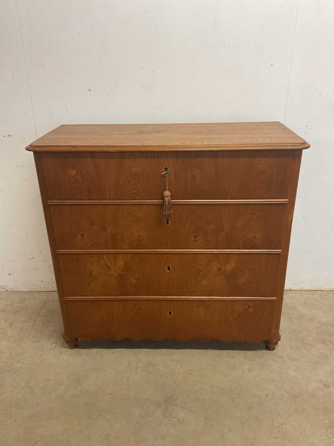 Lot 543 - A light oak chest of four drawers, height...