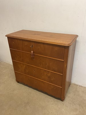 Lot 543 - A light oak chest of four drawers, height...