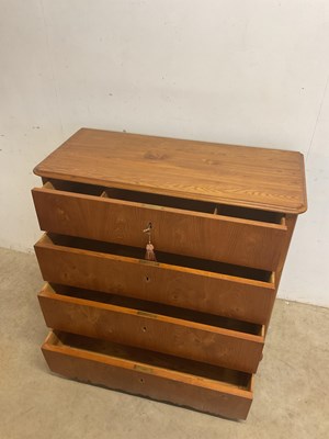 Lot 543 - A light oak chest of four drawers, height...