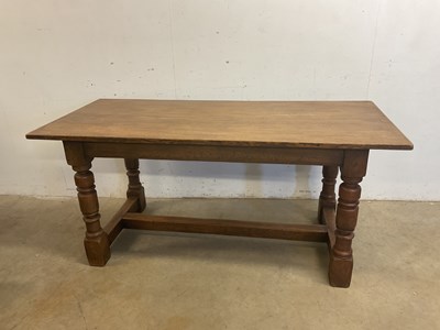 Lot 553 - An oak refectory table with central stretcher,...