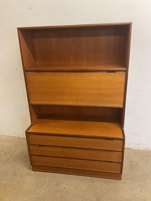 Lot 619 - TURNIDGE OF LONDON; a teak desk/bureau with...