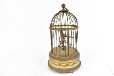 Lot 211 - A vintage singing bird automaton in gilt metal...