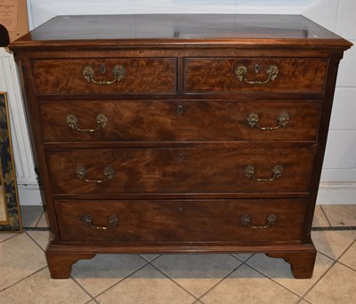 Lot 1 - A good George III mahogany chest of two short...