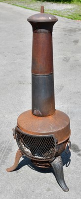 Lot 2383 - A cast metal chiminea, height 135cm.