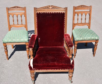 Lot 2457 - A Victorian oak framed elbow chair on turned...
