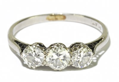 Lot 40 - A platinum and diamond three stone ring, the...