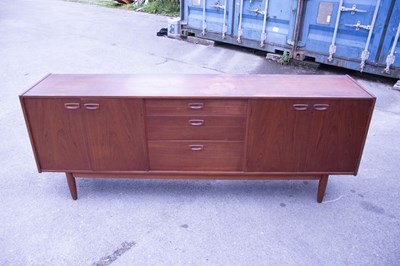 Lot 2561 - G-PLAN; a mid century teak sideboard, with...
