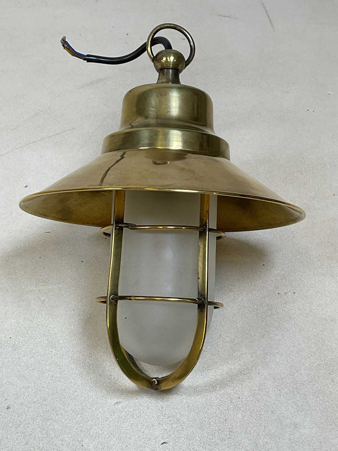 Lot 501 - A reproduction brass ship's light, height 29cm