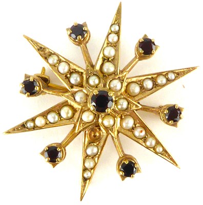 Lot 859 - An Edwardian 9ct gold garnet and seed pearl...