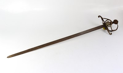 Lot 574 - An 18th century basket hilted sword, length 85cm.