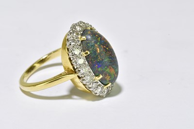 Lot 68 - A yellow metal black opal and diamond set ring,...