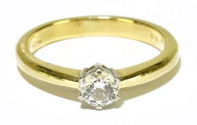 Lot 57 - An 18ct yellow gold diamond solitaire ring,...