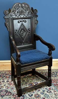 Lot 2520 - A carved oak wainscot type chair, with...