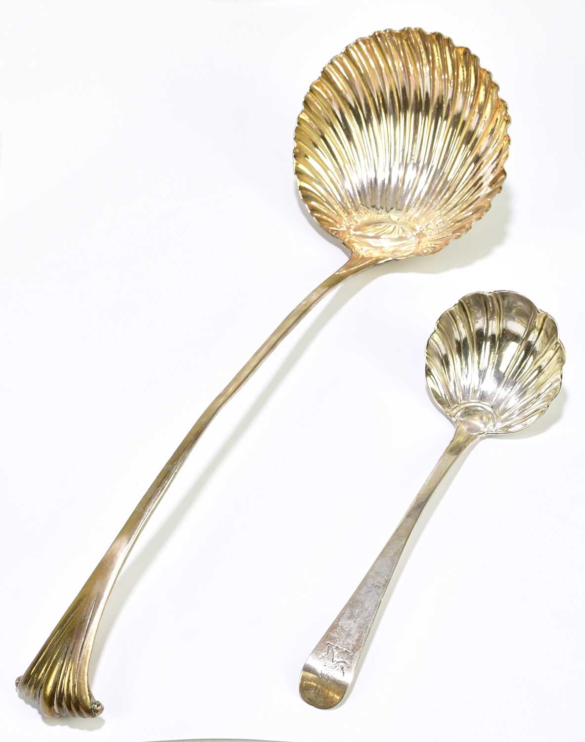 Lot 1204 A silver soup ladle with shell