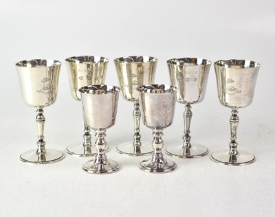 Lot 578 - Five Elizabeth II hallmarked silver wine cups,...