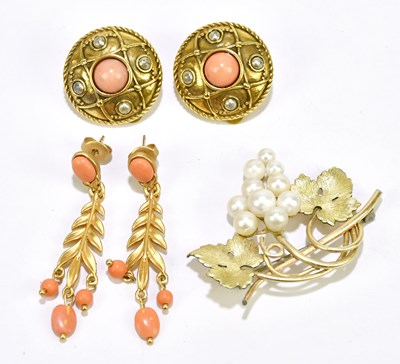 Lot 310 - A yellow metal seed pearl leaf decorated...