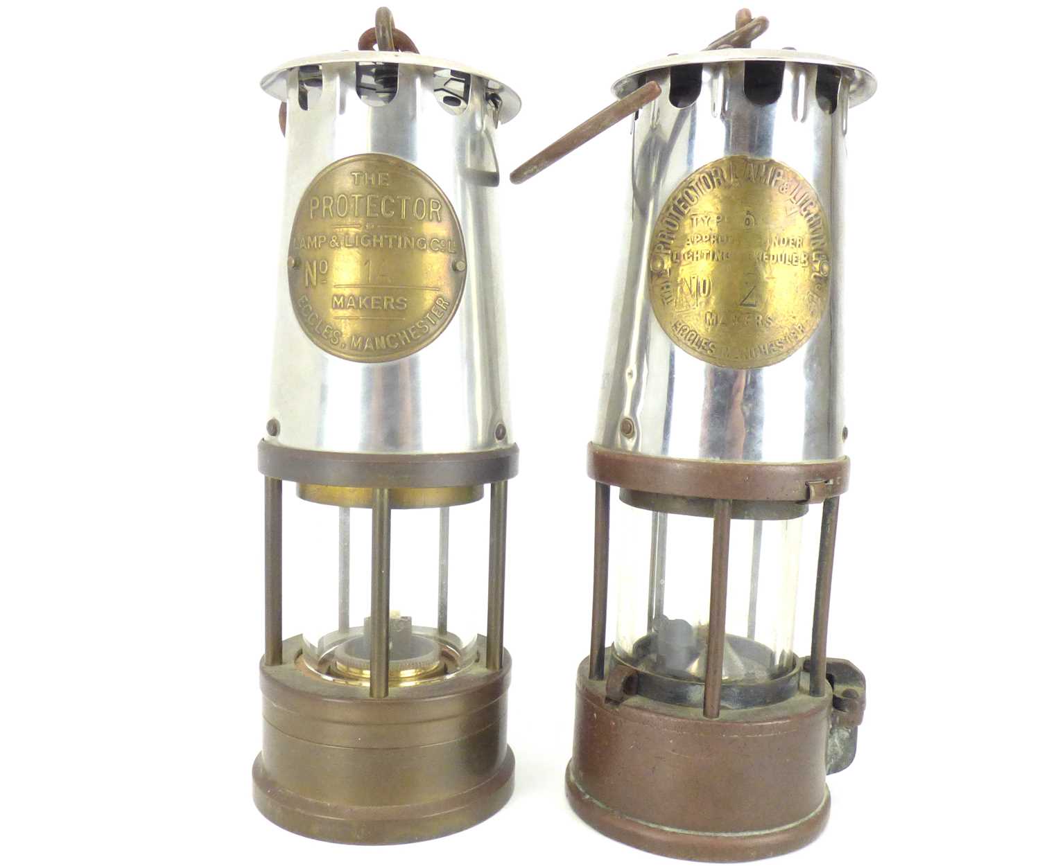 Lot 136 - Two original Eccles Protector miners' lamps