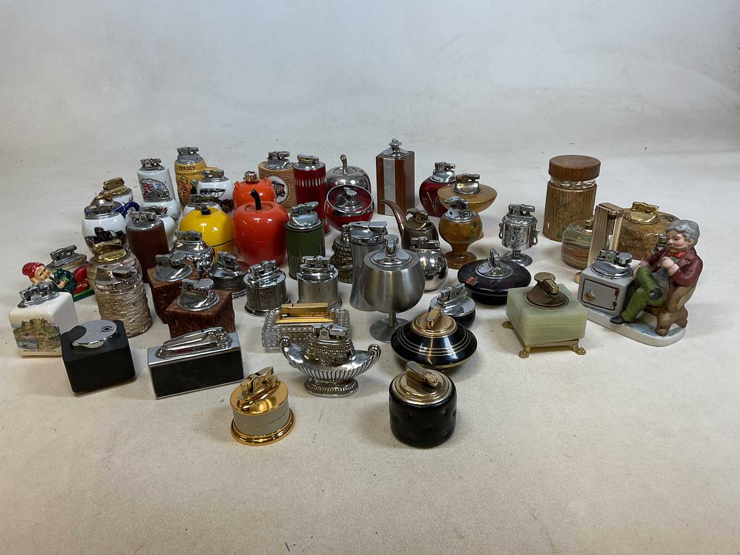 Lot 28 - A collection of table lighters (approx 50)...