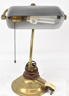 Lot 83 - A vintage brass desk lamp with green enamel...