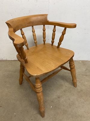 Lot 614 - A beech wood smoker's bow armchair, overall...